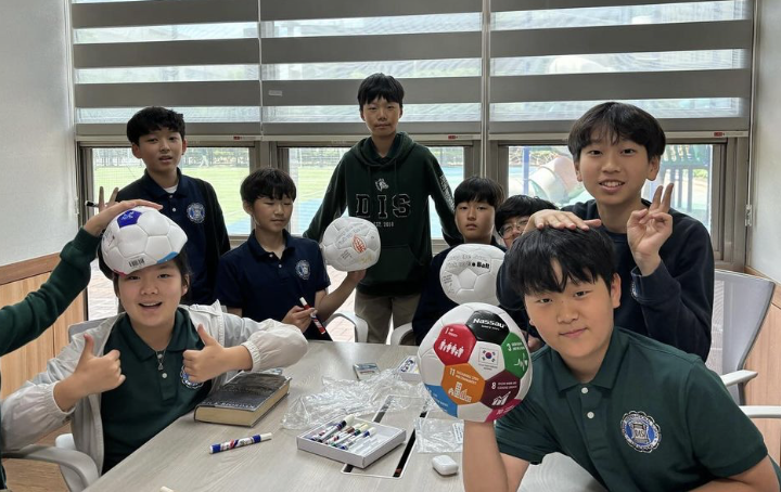 Key Club students working together around a table